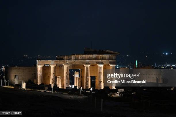 The Erechtheion Temple is illuminated, prior to the arrival of the Olympic flame atop the Acropolis, as part of the 11-day Greek torch relay of the...