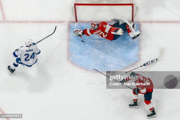 Goaltender Sergei Bobrovsky of the Florida Panthers dives back to make a save against Matt Dumba of the Tampa Bay Lightning in the second period in...
