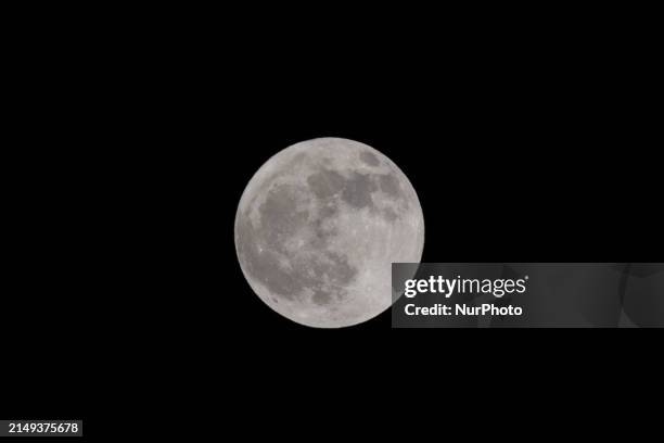 The full Pink Moon is seen in Lecce, Italy, on April 24, 2024.