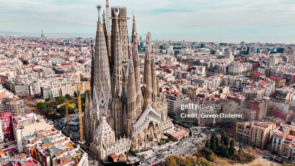 Aerial view of Sagrada Familia Cathedral in Barcelona, Catalonia, Spain, Aerial view of Barcelona Eixample residential area and Sagrada Familia Basilica, most famous travel destinations in europe