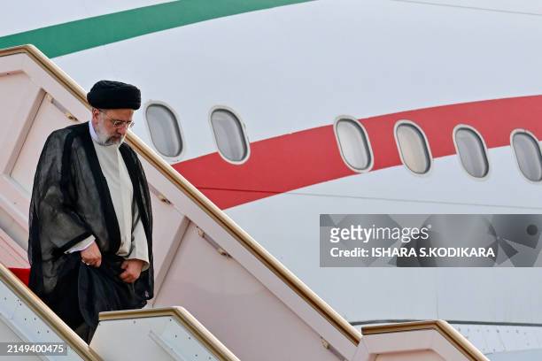Iran's President Ebrahim Raisi arrives at Bandaranaike International Airport in Katunayake near Colombo on April 24, 2024. Raisi arrived in Sri Lanka...