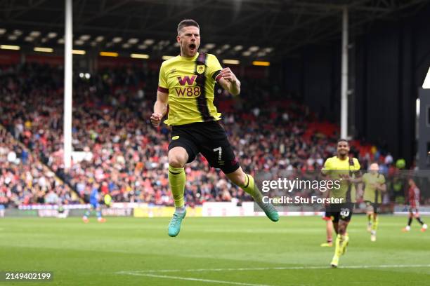 Johann Gudmundsson of Burnley celebrates scoring his team's fourth goal during the Premier League match between Sheffield United and Burnley FC at...