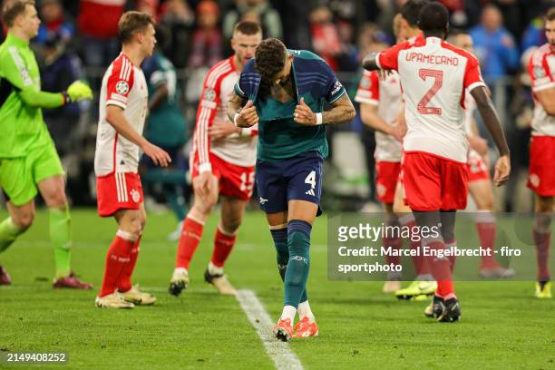 Ben White of Arsenal FC looks dejected after the UEFA Champions League quarter-final second leg match between FC Bayern München and Arsenal FC at...
