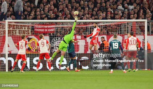 Goalkeeper Manuel Neuer of FC Bayern München makes a save during the UEFA Champions League quarter-final second leg match between FC Bayern München...