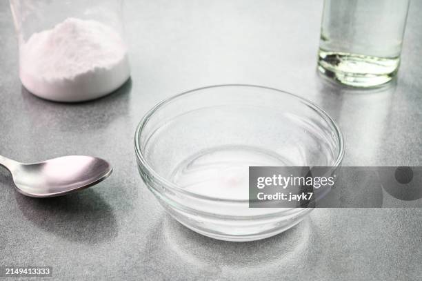 baking soda and vinegar - aceto foto e immagini stock