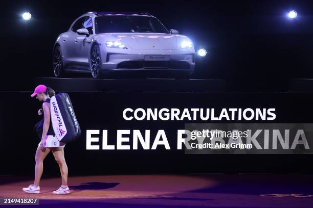 Iga Swiatek of Poland leaves the court after her defeat to Elena Rybakina of Kazakhstan in the semi-final match on day six of the Porsche Tennis...