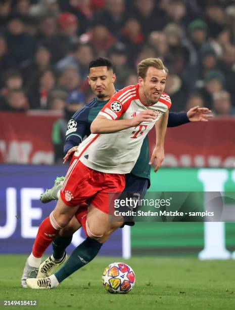 Harry Kane of Bayern Muenchen vies with William Saliba of FC Arsenal during the UEFA Champions League quarter-final second leg match between FC...
