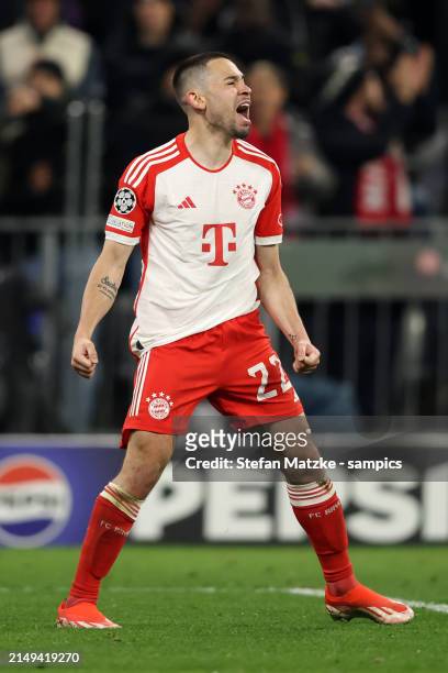 Raphael Guerreiro of Bayern Muenchen celebrate with the fans after their sides victory the UEFA Champions League quarter-final second leg match...