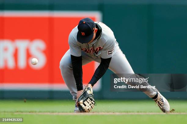 Spencer Torkelson of the Detroit Tigers commits a fielding error against the Minnesota Twins in the fifth inning at Target Field on April 20, 2024 in...