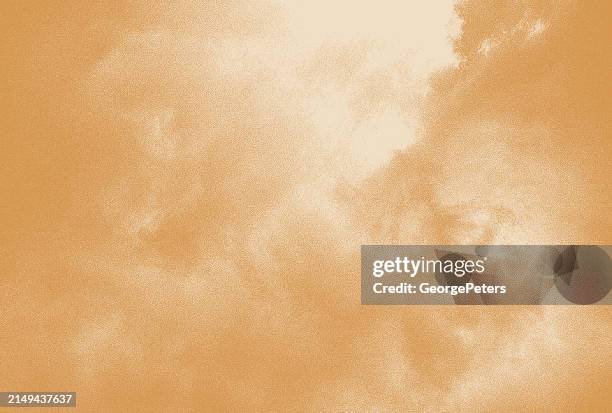 vector stipple illustration of storm clouds background - sepia toned background stock illustrations