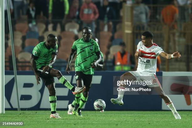 Seifeddine Jaziri of Zamalek is battling for the ball with John Antwi of Dreams during the CAF Confederations Cup knockout stage semifinal match...