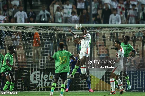 Ibrahima Ndiaye of Zamalek is battling for the ball with Mccarthy Ofori of Dreams during the CAF Confederations Cup knockout stage semifinal match...