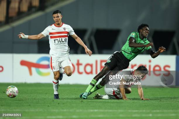 Hamza Mathlouthi of Zamalek is battling for the ball with Emmanuel Agyei of Dreams during the CAF Confederations Cup knockout stage semifinal match...