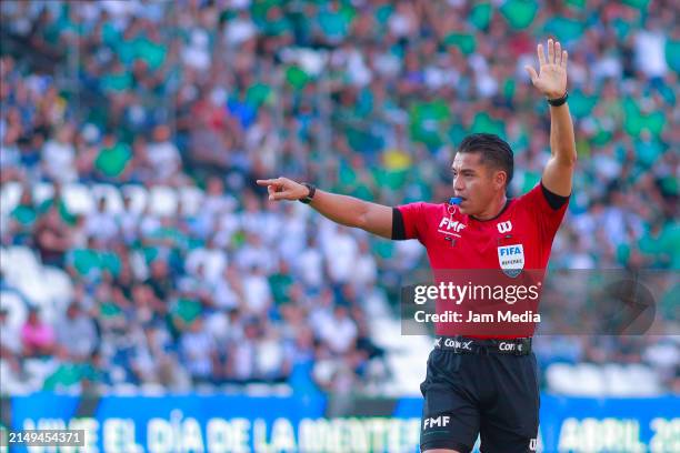 Victor Alfonso Caceres, central referee, gestures during the 16th round match between Leon and Monterrey as part of the Torneo Clausura 2024 Liga MX...