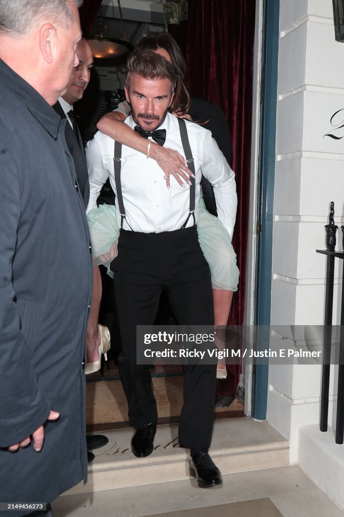 David Beckham and Victoria Beckham are seen leaving Victoria... News ...