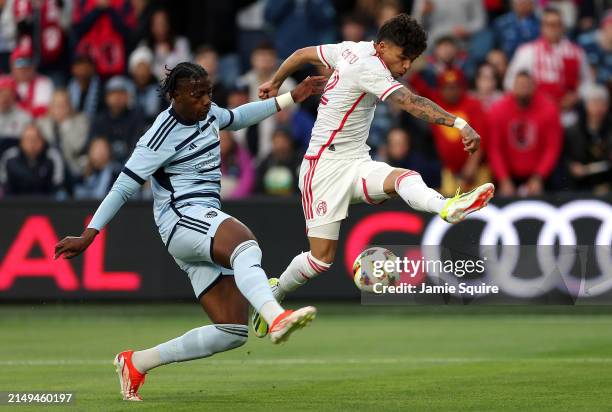 Célio Pompeu of St. Louis City controls the ball as Dany Rosero of Sporting Kansas City defends during the first half of the match at Children's...