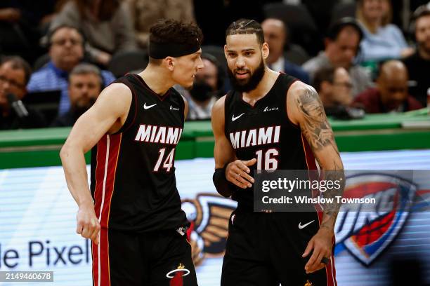 Tyler Herro and Caleb Martin of the Miami Heat celebrate together during the fourth quarter of their win over the Boston Celtics in game two of the...