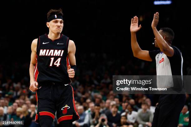 Tyler Herro of the Miami Heat looks at his bench after making a three-point basket against the Boston Celtics during the second quarter of game two...