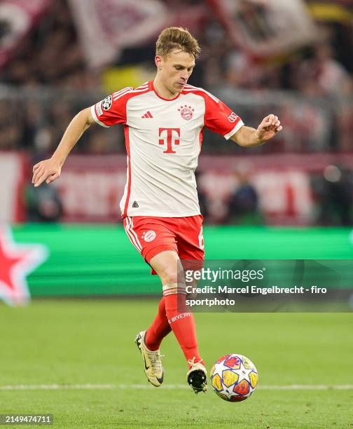Joshua Kimmich of FC Bayern München plays the ball during the UEFA Champions League quarter-final second leg match between FC Bayern München and...