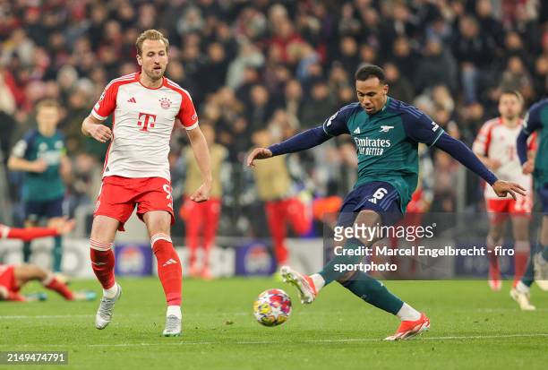 Harry Kane of FC Bayern München and Gabriel of Arsenal FC compete for the ball during the UEFA Champions League quarter-final second leg match...