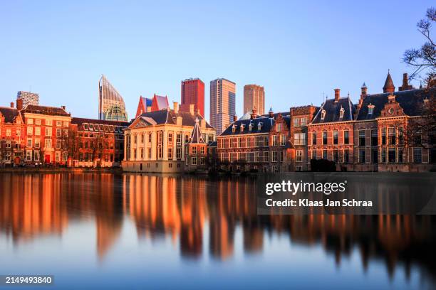 the hague, house of parlement at sunset - south holland stock pictures, royalty-free photos & images