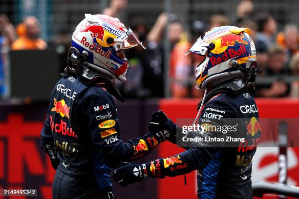 Race winner Max Verstappen of the Netherlands and Oracle Red Bull Racing and Third placed Sergio Perez of Mexico and Oracle Red Bull Racing celebrate...