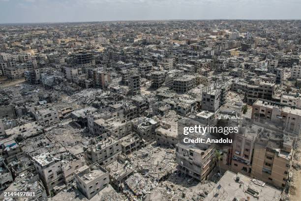 An aerial view of the heavily damaged, collapsed buildings of Khan Yunis, Gaza caused by Israeli attacks on April 21, 2024. Roads, workplaces and...