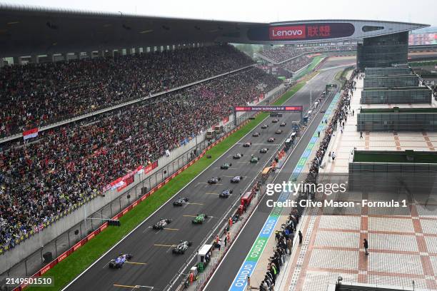 Max Verstappen of the Netherlands driving the Oracle Red Bull Racing RB20 leads the field off the grid at the start during the F1 Grand Prix of China...