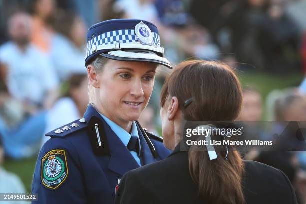 Police Inspector Amy Scott attends a community candlelight vigil for the victims of the Bondi Junction tragedy at Dolphin Court at Bondi Beach on...