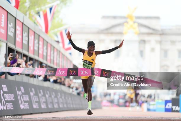 Peres Jepchirchir of Kenya celebrates after winning the Women's elite race and setting a new world record during the 2024 TCS London Marathon on...