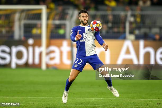 Mario Hermoso of Atletico Madrid runs with the ball during the UEFA Champions League quarter-final second leg match between Borussia Dortmund and...