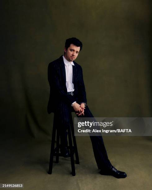 Asa Butterfield is photographed backstage at the 2024 BAFTA Games Awards, held on April 12, 2024 in London, England.