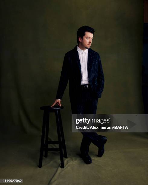 Asa Butterfield is photographed backstage at the 2024 BAFTA Games Awards, held on April 12, 2024 in London, England.