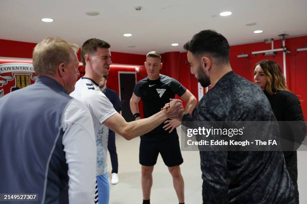 Ben Sheaf of Coventry City embraces Bruno Fernandes of Manchester United prior to the Emirates FA Cup Semi Final match between Coventry City and...