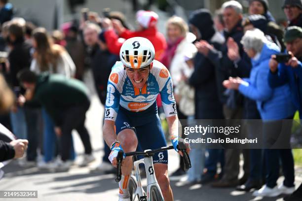 Romain Bardet of France and Team dsm-firmenich PostNL competes in the chase group while fans cheer during the 110th Liege - Bastogne - Liege 2024,...