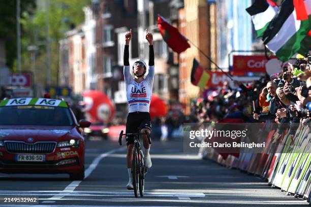 Tadej Pogacar of Slovenia and UAE Team Emirates celebrates at finish line as race winner during the 110th Liege - Bastogne - Liege 2024, Men's Elite...