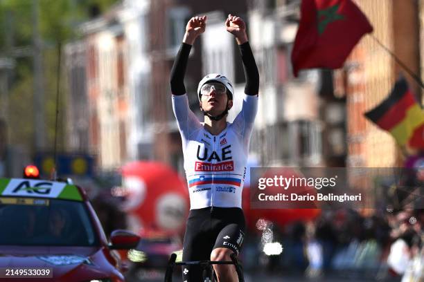 Tadej Pogacar of Slovenia and UAE Team Emirates celebrates at finish line as race winner during the 110th Liege - Bastogne - Liege 2024, Men's Elite...