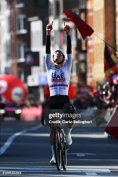 Tadej Pogacar of Slovenia and UAE Team Emirates celebrates at finish line as race winner during the 110th Liege - Bastogne - Liege 2024, Men's Elite...