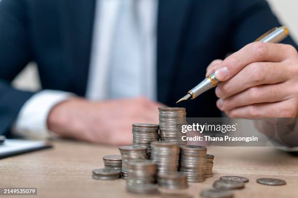 financial planning and saving money - cashew pieces stock pictures, royalty-free photos & images