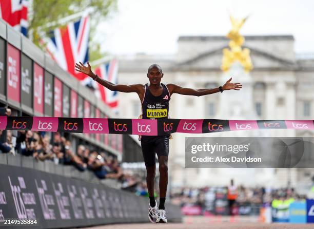 Alexander Mutiso Munyao of Kenya crosses the finish line to win the Men's elite race during the 2024 TCS London Marathon at on April 21, 2024 in...