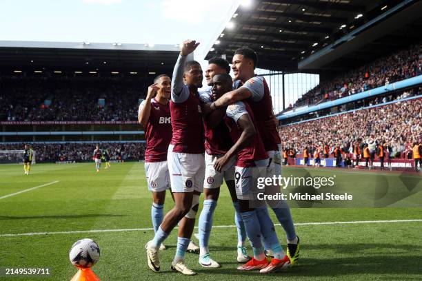 Moussa Diaby celebrates with Youri Tielemans, Leon Bailey, Ollie Watkins and Morgan Rogers of Aston Villa after scoring his team's second goal during...