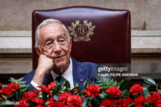 Portuguese President Marcelo Rebelo de Sousa looks on during the solemn session at the Portuguese Parliament in Lisbon on April 25 on the 50th...