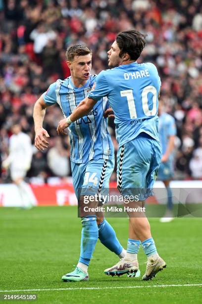 Callum O'Hare celebrates scoring his team's second goal with Ben Sheaf of Coventry City during the Emirates FA Cup Semi Final match between Coventry...