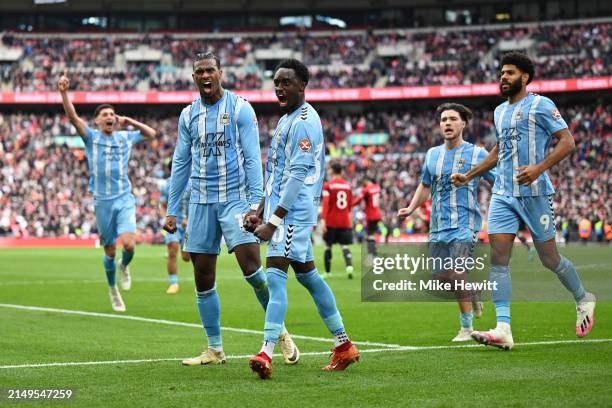 Haji Wright celebrates scoring his team's third goal from the penalty spot with Fabio Tavares of Coventry City during the Emirates FA Cup Semi Final...