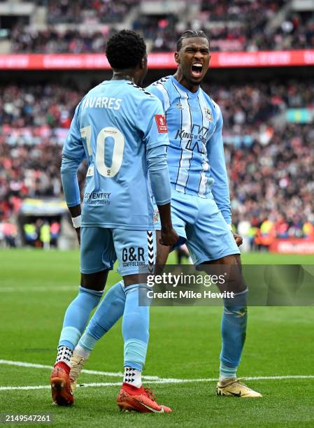Haji Wright celebrates scoring his team's third goal from the penalty spot with Fabio Tavares of Coventry City during the Emirates FA Cup Semi Final...