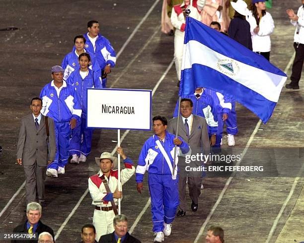 The delegation from Nicaragua march in the Olympic Stadium during the opening ceremony of the 2000 Summer Olympics in Sydney, 15 September 2000. AFP...