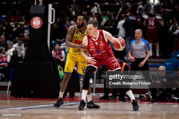 Kruize Pinkins of Givova Scafati Basket and Johannes Voigtmann of EA7 Emporio Armani Milan in action during the LBA Lega Basket Serie A Round 28...