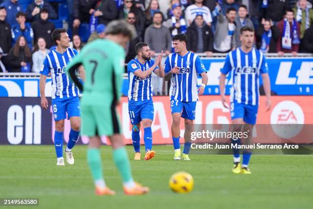 Luis Rioja of Deportivo Alaves celebrates scoring his team's second goal with teammate Javi Lopez during the LaLiga EA Sports match between Deportivo...