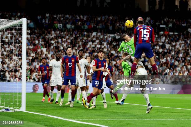 Andreas Christensen of FC Barcelona scores his team's first goal during the LaLiga EA Sports match between Real Madrid CF and FC Barcelona at Estadio...
