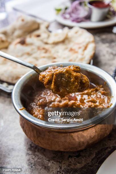 serving lamb karahi - lamb korma stock pictures, royalty-free photos & images